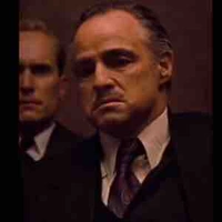 Ông trùm sát thủ (bố nuôi của anh)