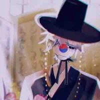 K.E