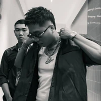 Vũ Ngọc Chương (Right)