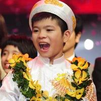 Q.anh bé( 8 Tuổi )