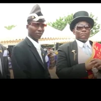 Anh da đen khiêng quan tài