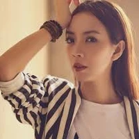 Thu Trang ( mẹ Huy)