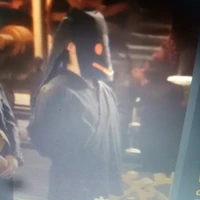 Người mặc đồ đen của Toufu