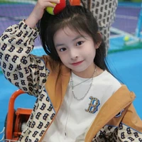 Lương Nguyễn Ngọc Trinh _ em họ Quang